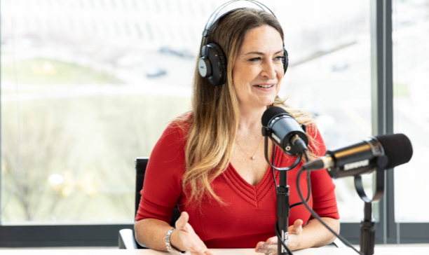 Lara Rhame conducting a podcast episode