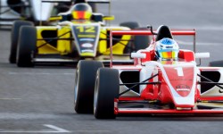 Formula One race cars driving