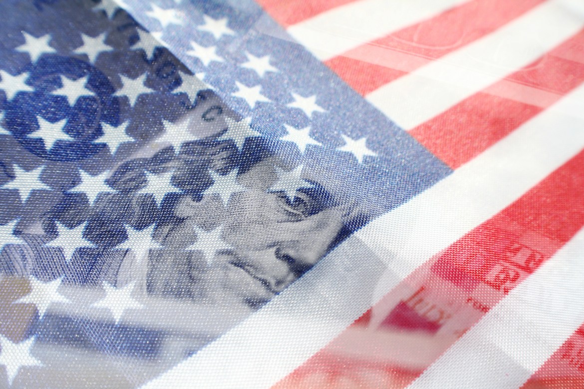 Benjamin Franklin On A One Hundred Dollar Bill With American Flag
